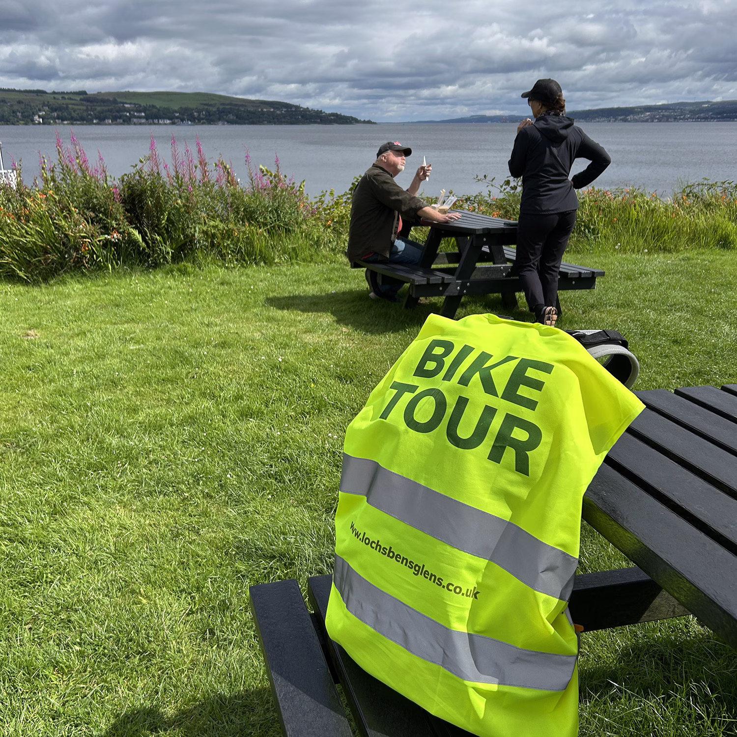 People enjoying a food stop at Blairmore on an e-bike tour