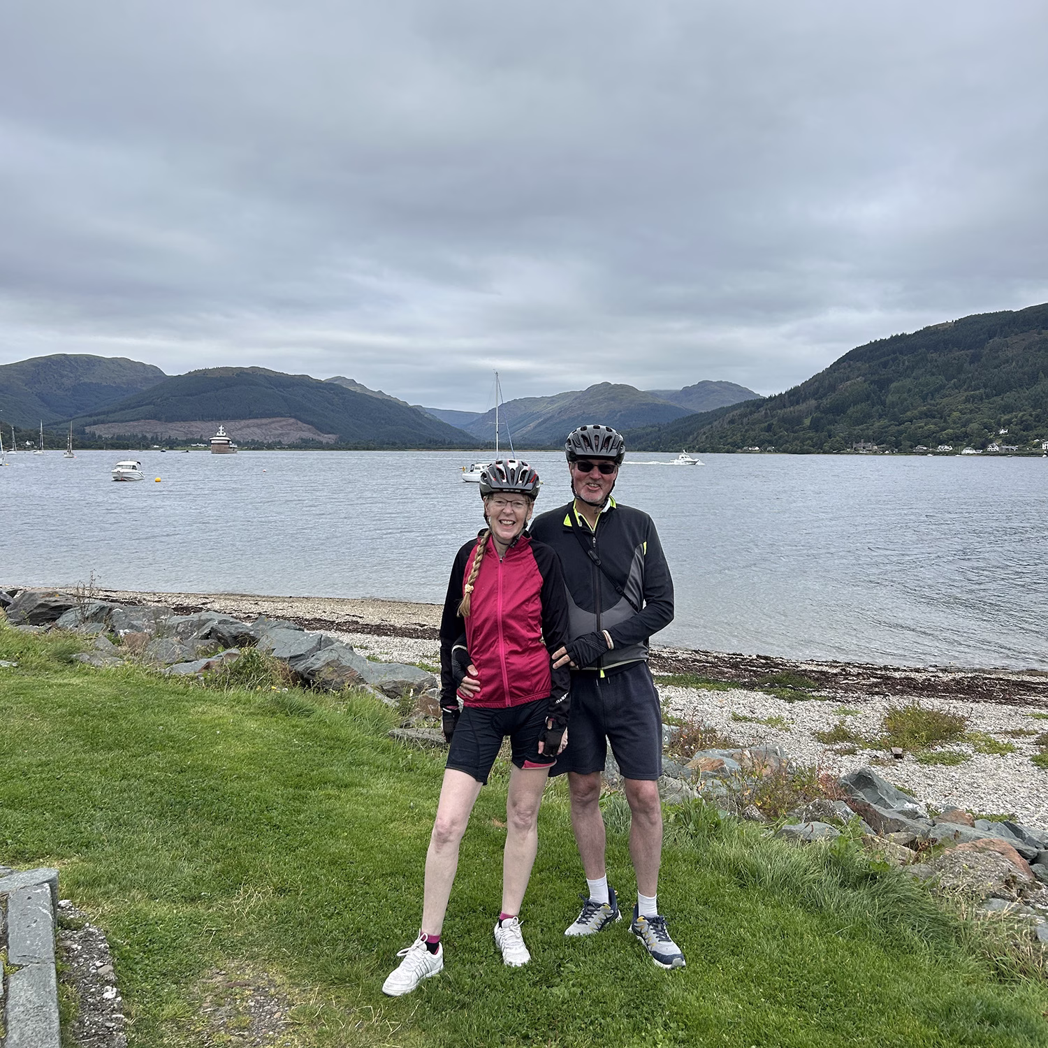 Couple in front of Holy Loch on e-bike tour