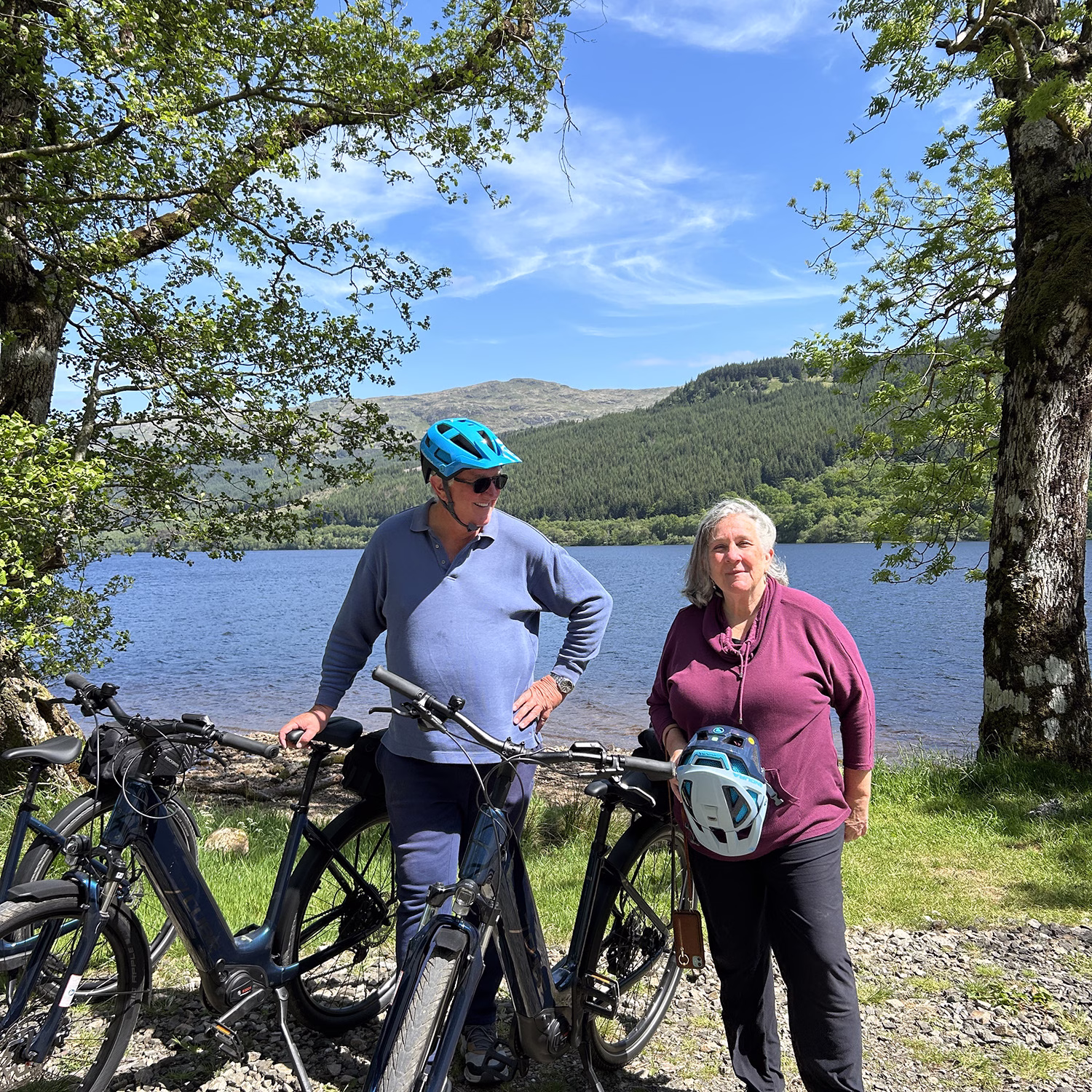 Couple with e-bikes at Loch Eck